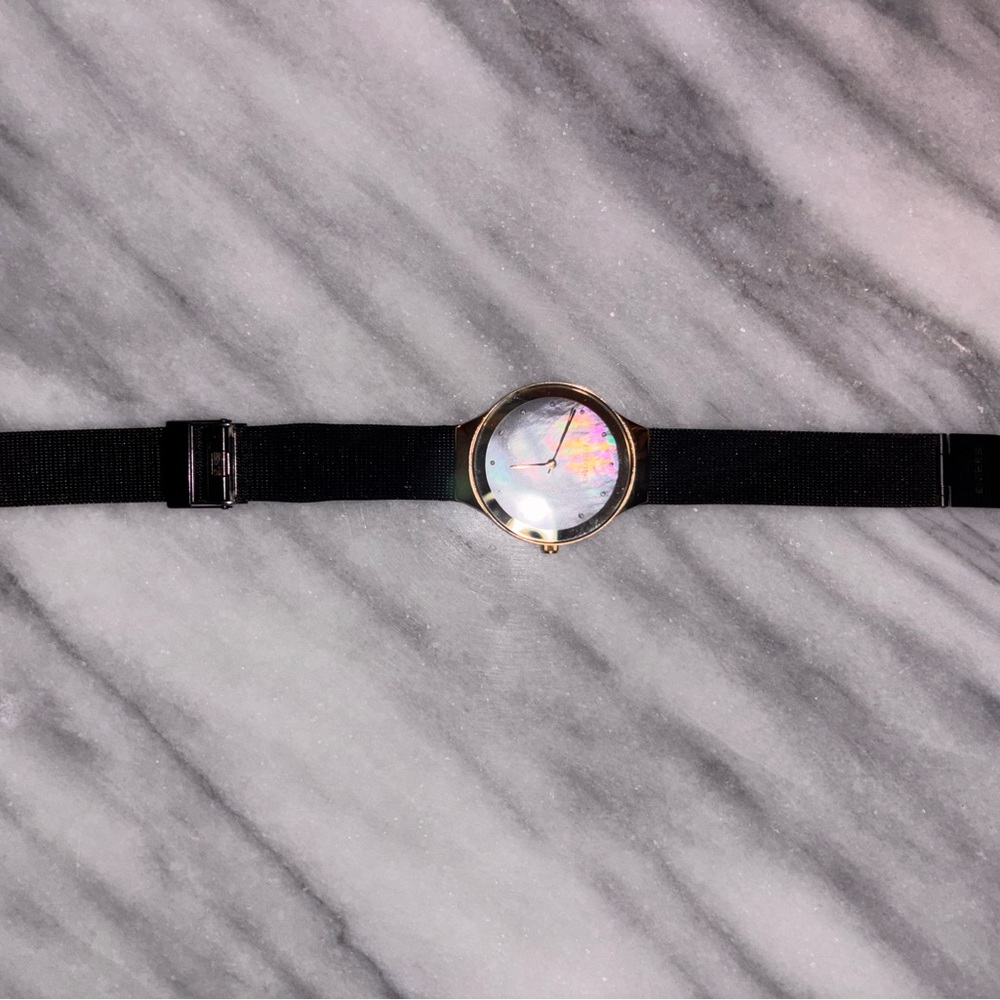 Elegant Black and Gold Women's Watch